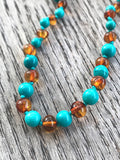 Polished Baltic amber and gemstone teething necklace